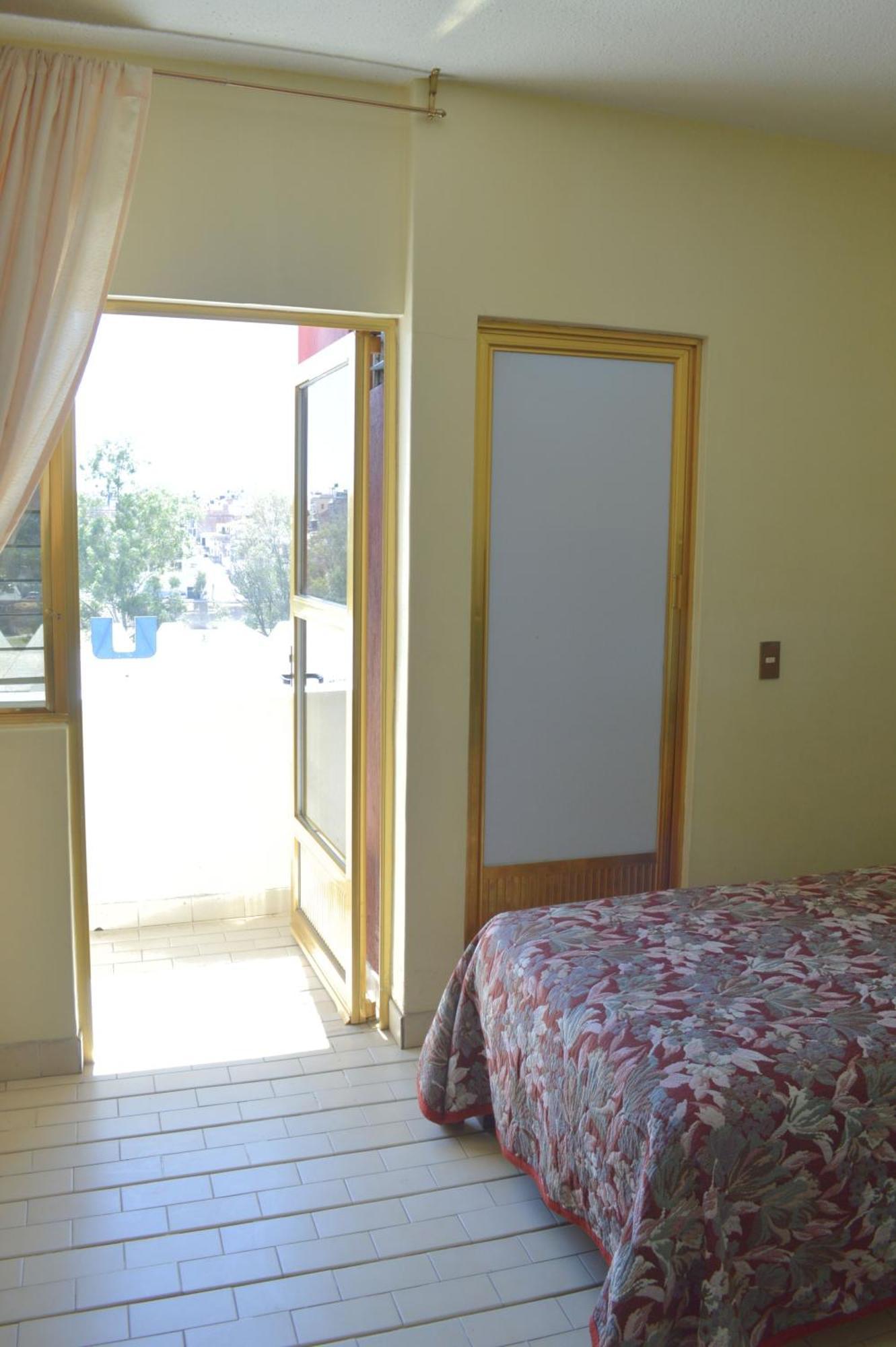 Hotel Topacio ซานฮวน เด ลอสลากอส ภายนอก รูปภาพ